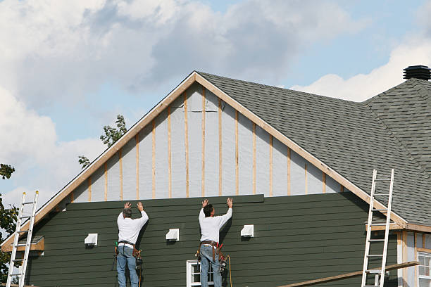 Professional Siding Replacement technician working in Woodstock, OH